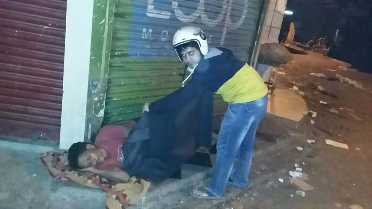 Image of blanket distribution to people in need 1